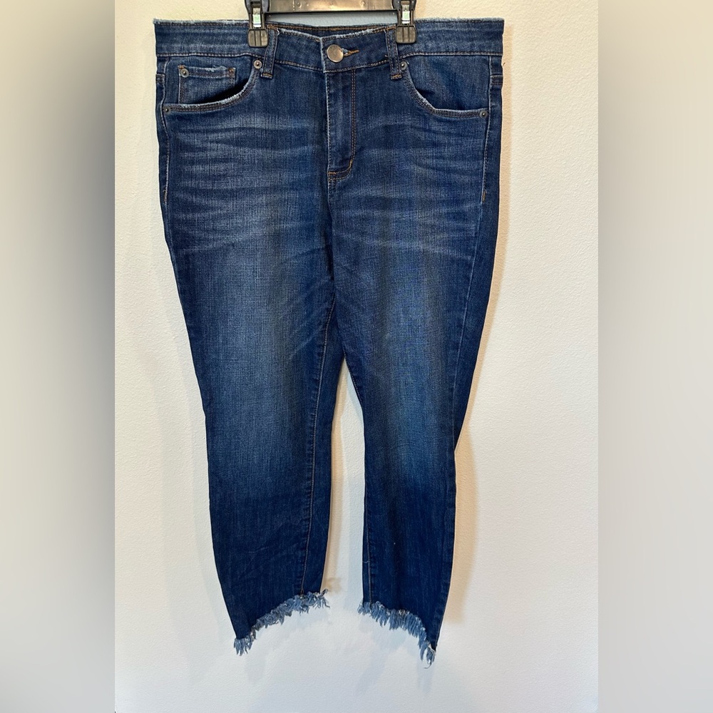 STS skinny jeans with distressed bottoms